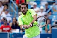 MASON, OH - AUGUST 21:  Marin Cilic of Croatia hits a return against Andy Murray in the final match during day 9 of the Western & Southern Open at the Lindner Family Tennis Center    on August 21, 2016 in Mason, Ohio.  (Photo by Andy Lyons/Getty Images)